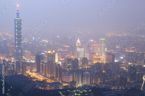 Wallpaper Mural Aerial view of Taipei City, Taipei 101, Xinyi commercial area, riverside and skyscrapers in downtown in evening twilight ~ Scenery of foggy Taipei City with polluted hazy air (PM 2.5 "Beyond Index" ) Torontodigital.ca