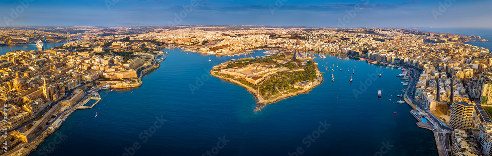 Valletta, Malta - Aerial panoramic skyline view of Valletta, Sliema, Manoel Island, Gzira, Ta' Xbiex, Msida and Floriana at sunrise