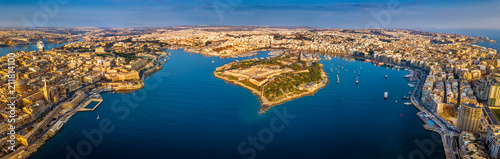 Fototapeta Naklejka Na Ścianę i Meble -  Valletta, Malta - Aerial panoramic skyline view of Valletta, Sliema, Manoel Island, Gzira, Ta' Xbiex, Msida and Floriana at sunrise