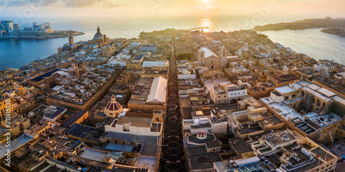 Valletta, Malta - Sunrise and the ancient city of Valletta from above with Triq Ir-Repubblika, the narrow high street of Valletta photo