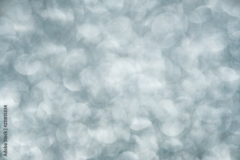 Blurred gray bokeh abstract background.use as backdrop for holiday or anniversary occasion celebration. Blurred gray bokeh abstract background.use as backdrop for holiday or anniversary occasion celebration.