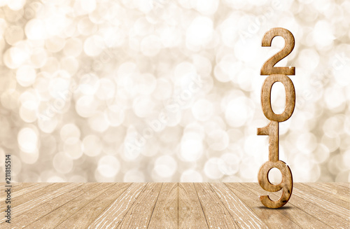 2019 happy year wood number in perspective room with sparkling bokeh wall and wooden plank floor.copy space for display of product or text.