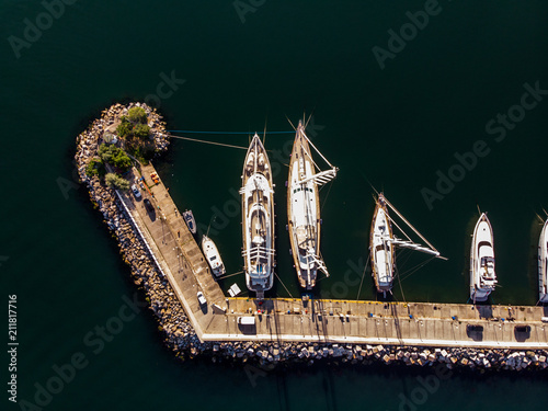 Aerial Drone View of Kalamis Fenerbahce Marina with Boats Docked in Voula Istanbul / Birds Eye View. photo