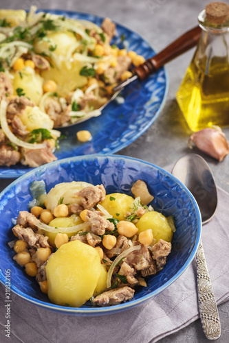 Stewed lamb with potatoes and chikpeas. photo