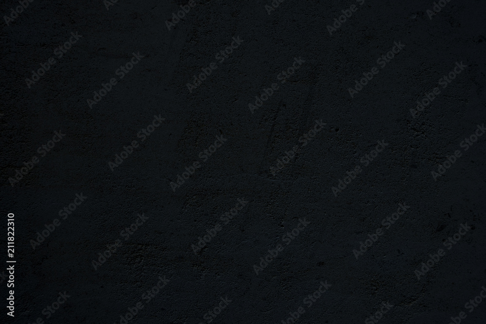 dark black textured stucco cement wall surface dark black textured stucco cement wall surface
