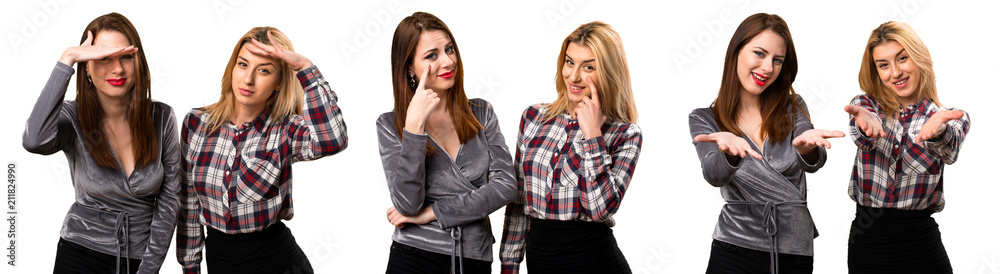 Set of Two friends showing something Set of Two friends showing something