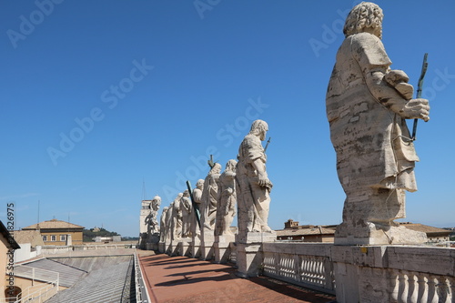 Sculptures on the roof of St. Peter's Basilica in the Vatican in Rome, Italy