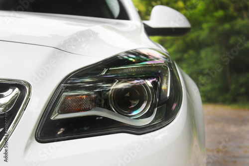 Luxury Headlights. White car