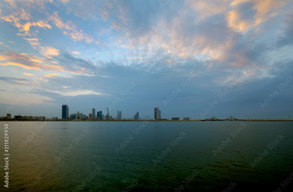 Dramatic clouds and  Bahrain skyline during sunset