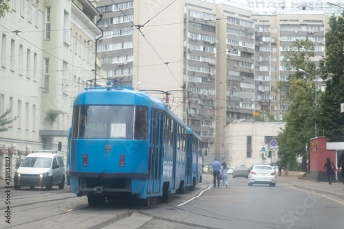 a blue tram ride down the Street in Moscow