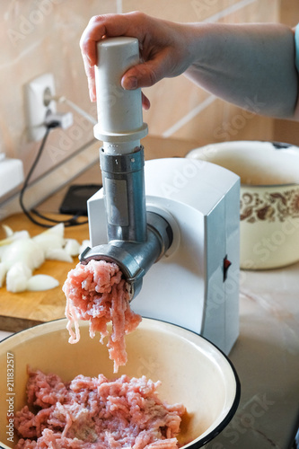 minced meat in a meat grinder