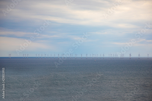 Offshore Windmill farm in the ocean Westermeerwind park, Denmark