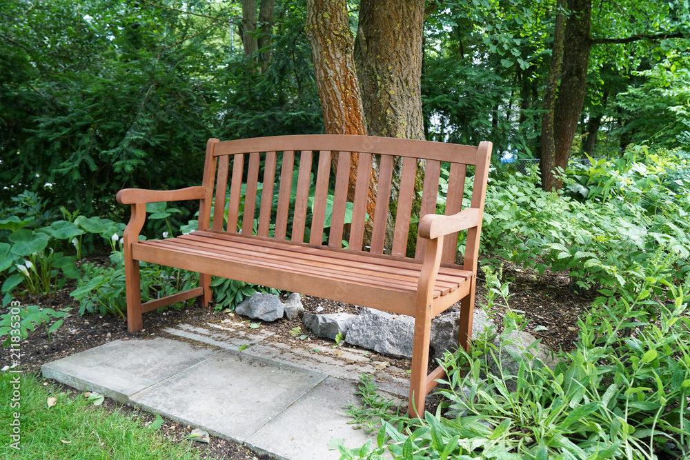 Park bench in a Bavarian park to relax and rest

