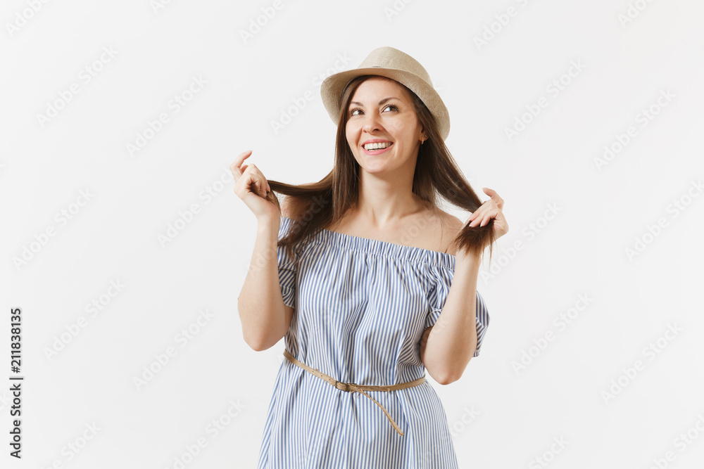 Young tender elegant charming woman dressed blue dress, cute hat with long brunette hair posing isolated on white background. People, sincere emotions, lifestyle concept. Advertising area. Copy space. Young tender elegant charming woman dressed blue dress, cute hat with long brunette hair posing isolated on white background. People, sincere emotions, lifestyle concept. Advertising area. Copy space.