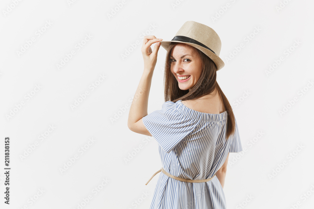 Young tender elegant charming woman dressed blue dress, cute hat with long brunette hair posing isolated on white background. People, sincere emotions, lifestyle concept. Advertising area. Copy space. Young tender elegant charming woman dressed blue dress, cute hat with long brunette hair posing isolated on white background. People, sincere emotions, lifestyle concept. Advertising area. Copy space.