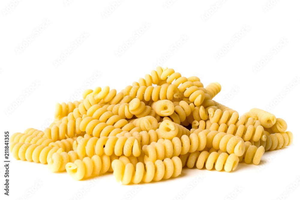 A bunch of pasta spiraling on a white, isolated. A bunch of pasta spiraling on a white, isolated.