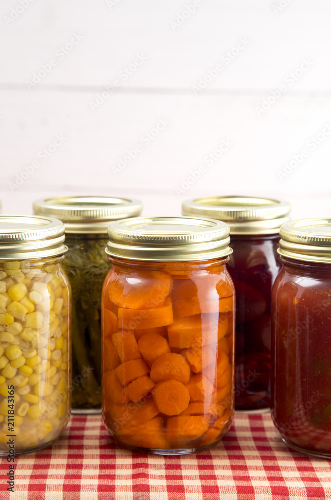 An Assortment of Various Fruits and Vegetables that have been Canned at Home An Assortment of Various Fruits and Vegetables that have been Canned at Home