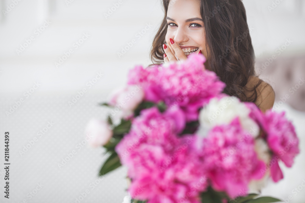 Young attractive woman with flowers Young attractive woman with flowers