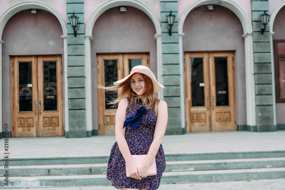 Naklejka premium happy girl summer dress on the street