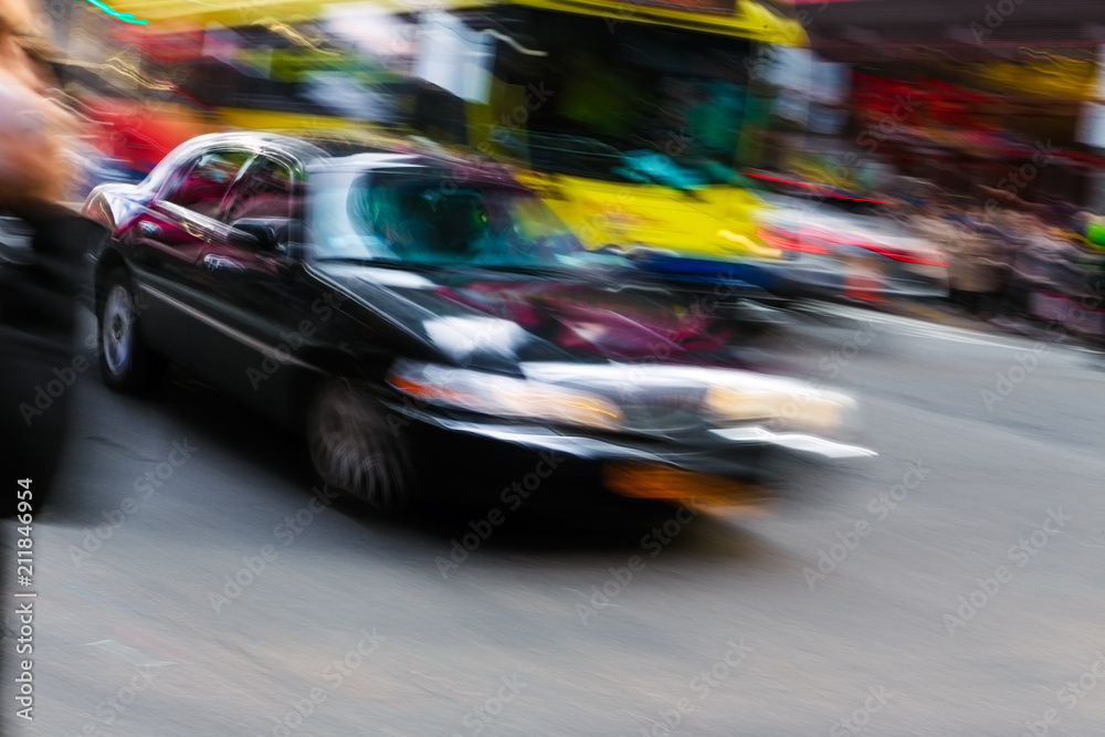 An abstract shot of a moving luxury town car in traffic in Manhattan, New York