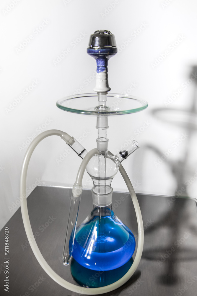 New Glass Hookah with beautiful backlight in the cafe New Glass Hookah with beautiful backlight in the cafe