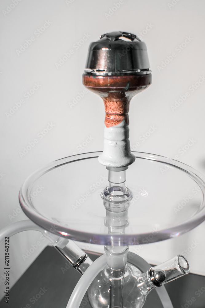 New Glass Hookah with beautiful backlight in the cafe New Glass Hookah with beautiful backlight in the cafe