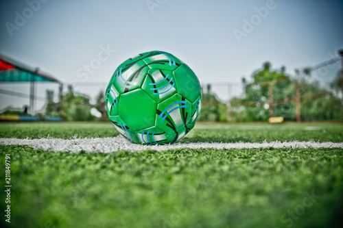 Mini Football Goal On An Artificial Grass . Inside of indoor football field . Mini soccer ball . HDR photo