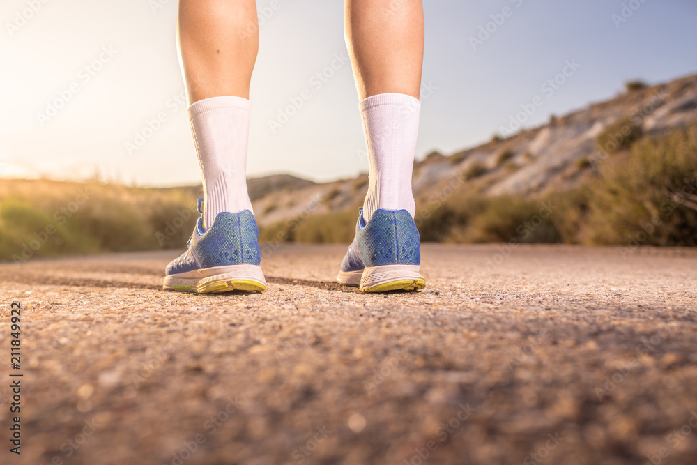 Young man running with greenish yellow shirt Young man running with greenish yellow shirt