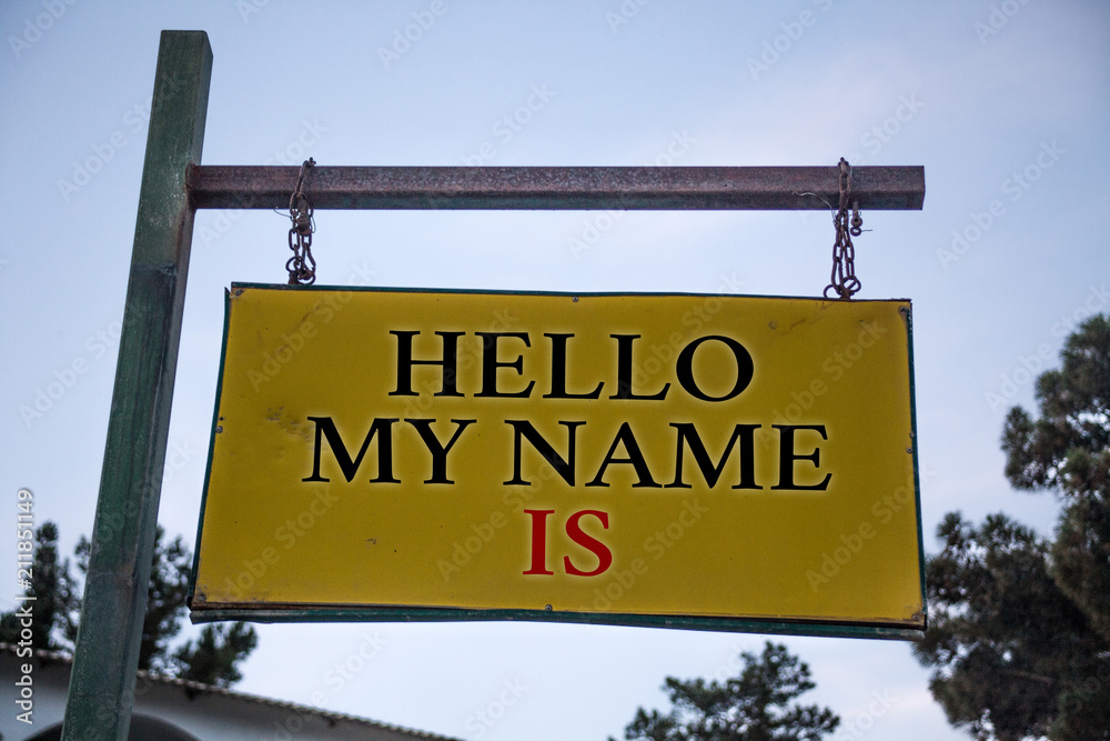 Handwriting text Hello My Name Is. Concept meaning Introduce yourself meeting someone new Presentation Messages object location yellow banner frame metal board billboard yellow.