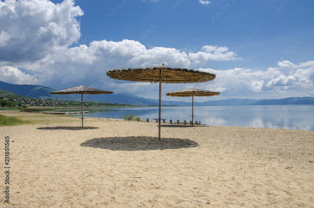 Fototapeta premium Sunshade on beach – Prespa Lake, Macedonia 