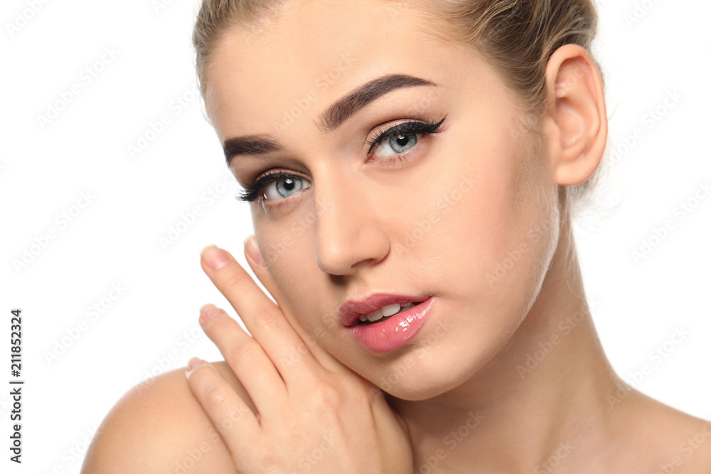 Young woman with beautiful eyebrows on white background, closeup Young woman with beautiful eyebrows on white background, closeup