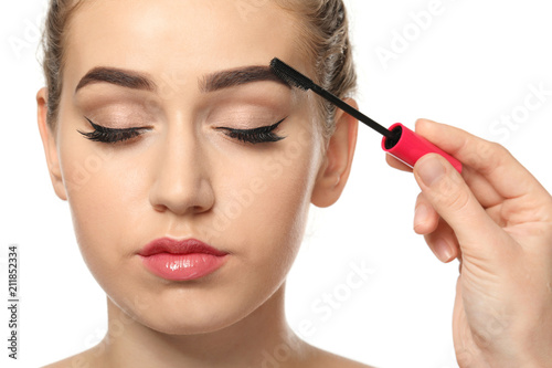 Young woman undergoing eyeb...