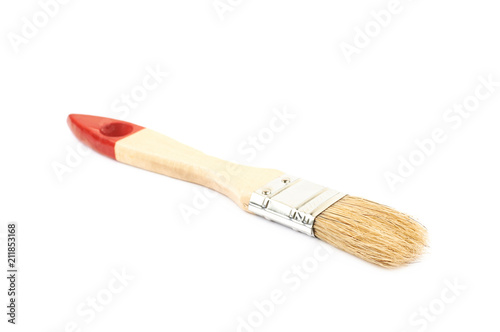 Wide wooden paint brush isolated