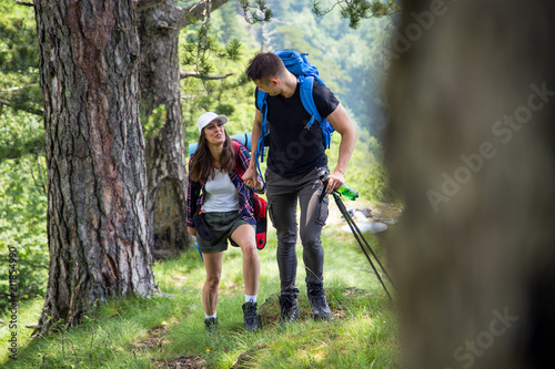 Couple enjoying on their hiking trip.Travel and adventure concept