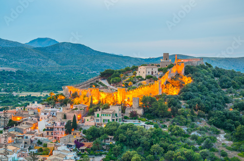 Night aerial view of Capdepera castle and Capdepera town, Mallorca, Spain photo