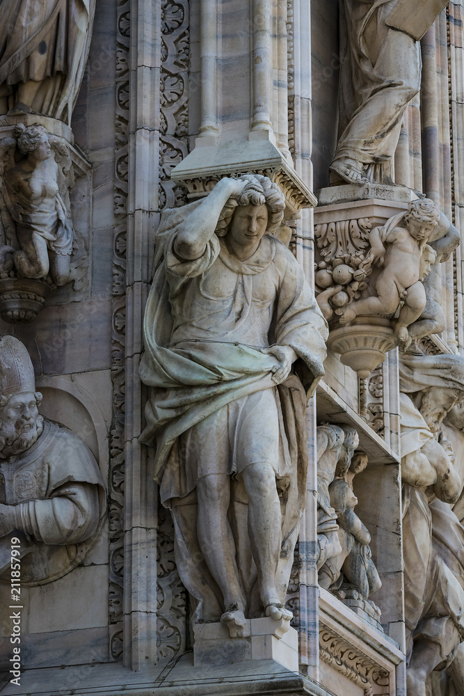  Sculptures of saints and martyrs decorating the Cathedral of Milan (Duomo di Milano) are shot close-up. 
