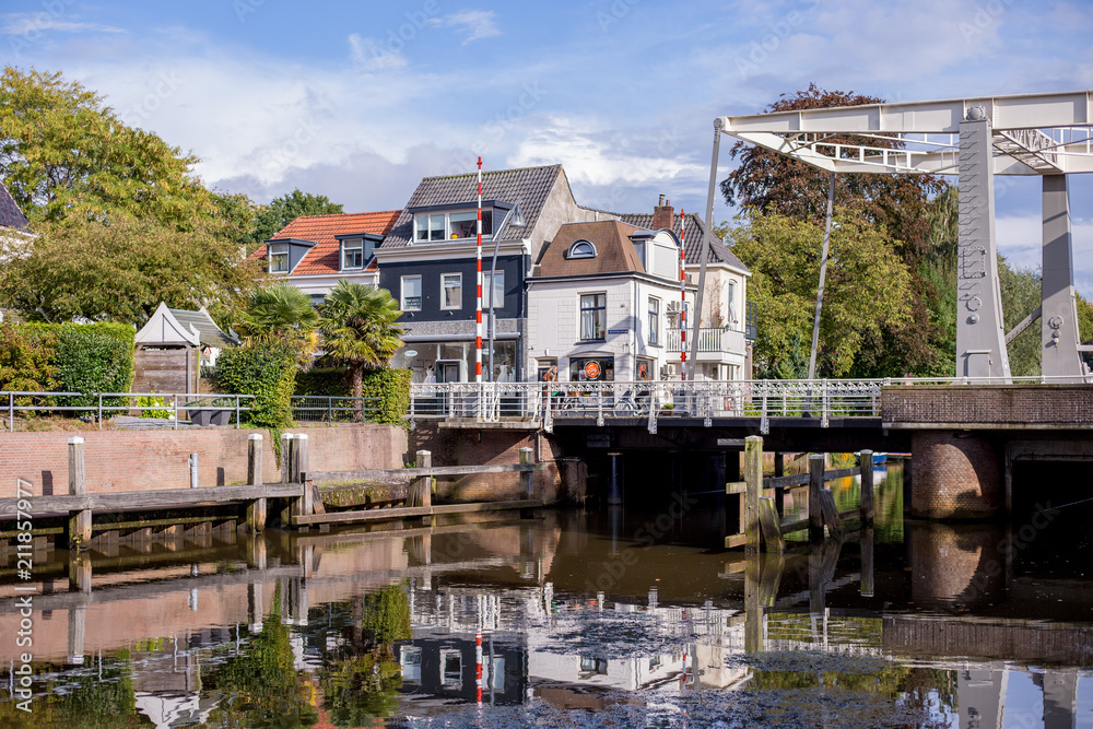 Canal view in a Dutch city with a draw bridge