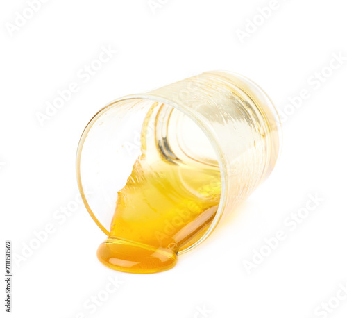 Glass shot of honey isolated