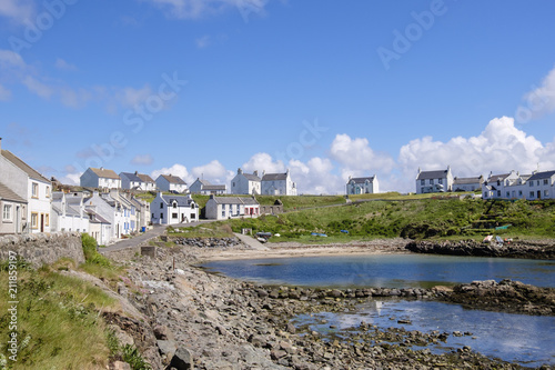 Cottages around harbour in village of Portnahaven, Isle of Islay, Argyll and Bute, Inner Hebrides, Scotland photo
