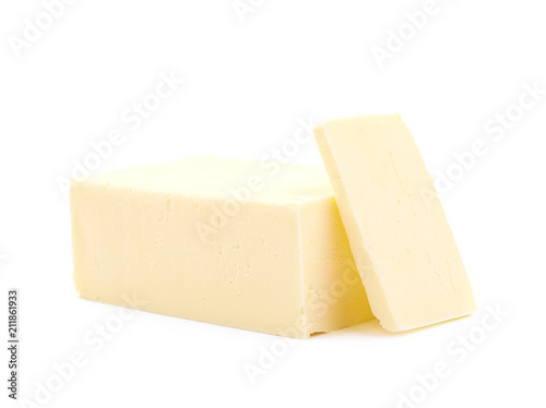 Slice block of butter isolated