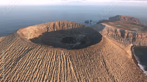 Aerial view of volcanic island, crater at sunrise - San Benedicto, Mexico