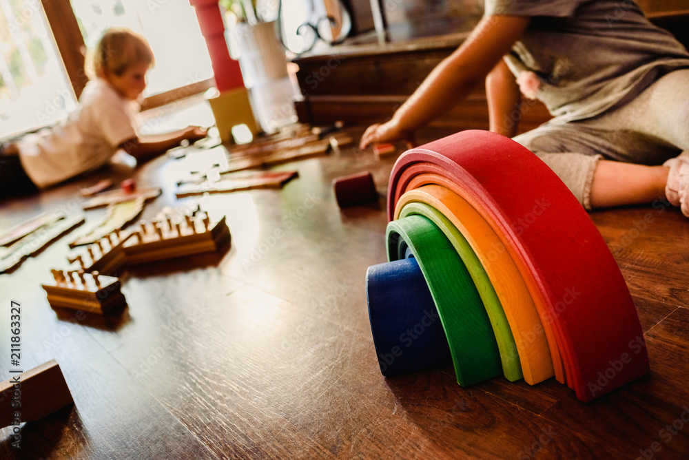 Children playing with wooden rainbow waldorf montessori Stock Photo ...