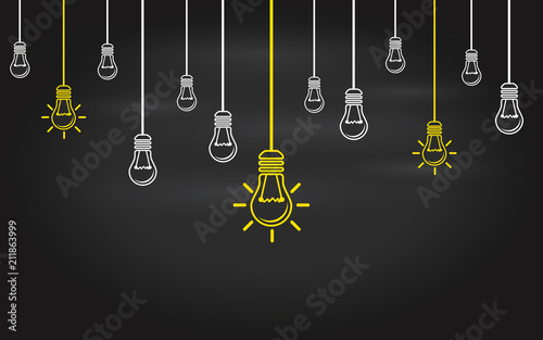 Light bulbs on a blackboard background. Creativity concept with innovation or inspiration in global business, thinking outside the box. Business strategy in startup. New leaderships on teamwork.