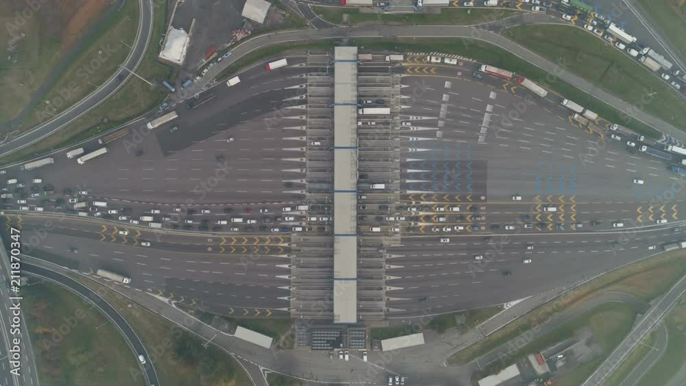 Abstract static drone shot of major toll booth on freeway in Milan, Italy Abstract static drone shot of major toll booth on freeway in Milan, Italy