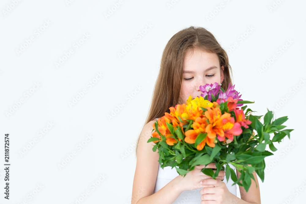 special flower bouquet delivery for someone you love. little girl holding a festive colorful floral arrangement of alstroemeria