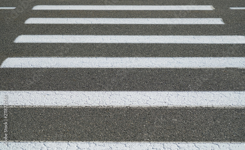  close up on street crossing zebra lines 