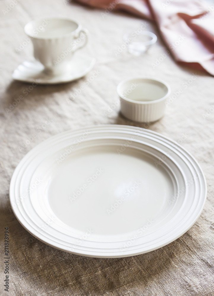 Elegant table set in modern style dining room interior Elegant table set in modern style dining room interior