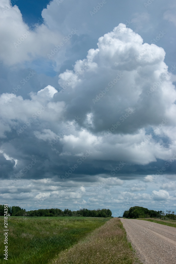 Range Road and Farm land in Saskatchewan, Canada. Range Road and Farm land in Saskatchewan, Canada.