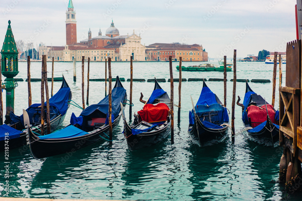 Gondolas moored by Saint Mark square