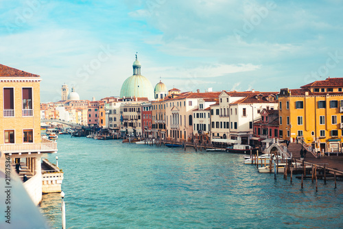 Venetian channel with ancient houses and boats